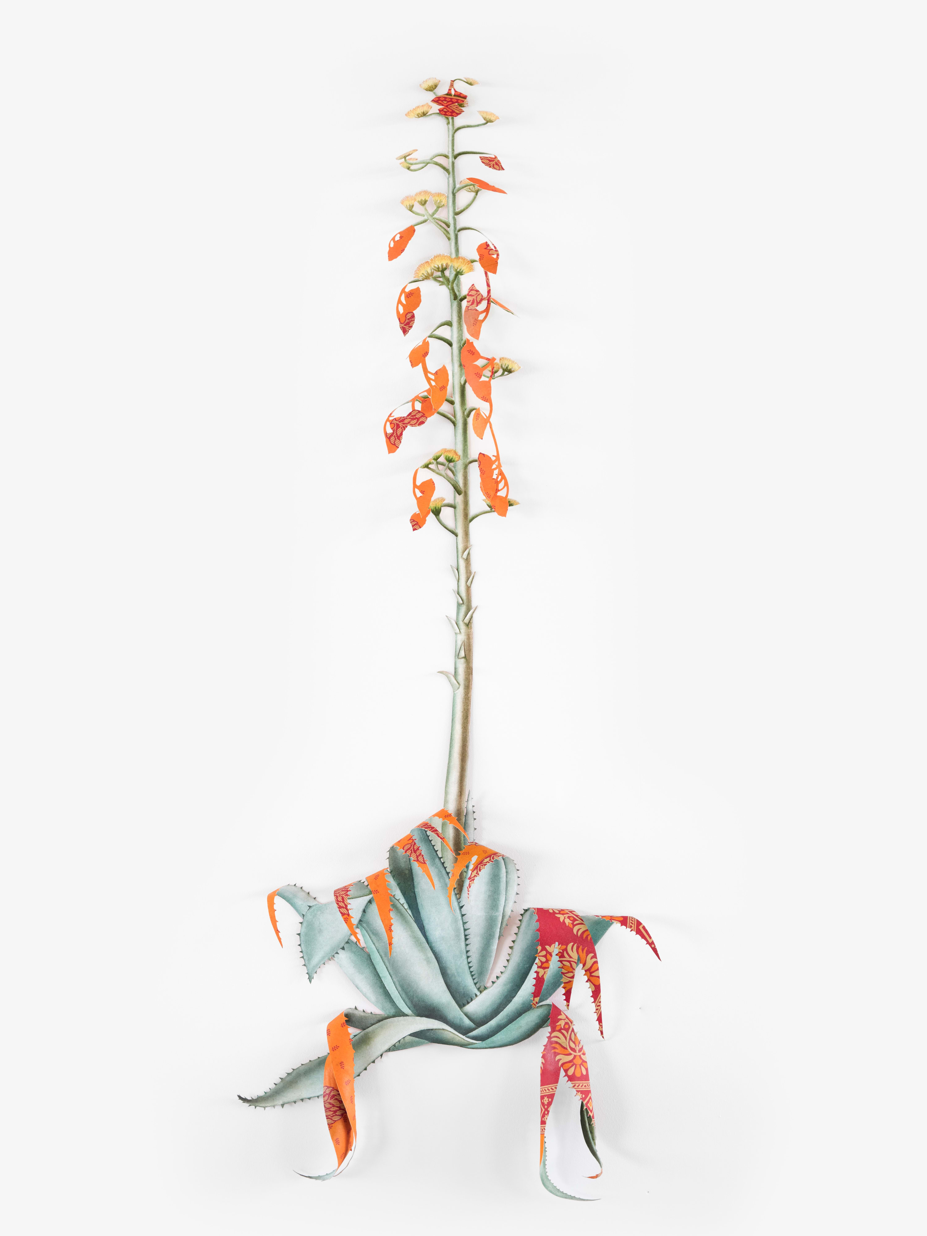 On the ground floor, a wall painting of tropical rainforests, painted in dark gray chalk, unfurls along the wall like...