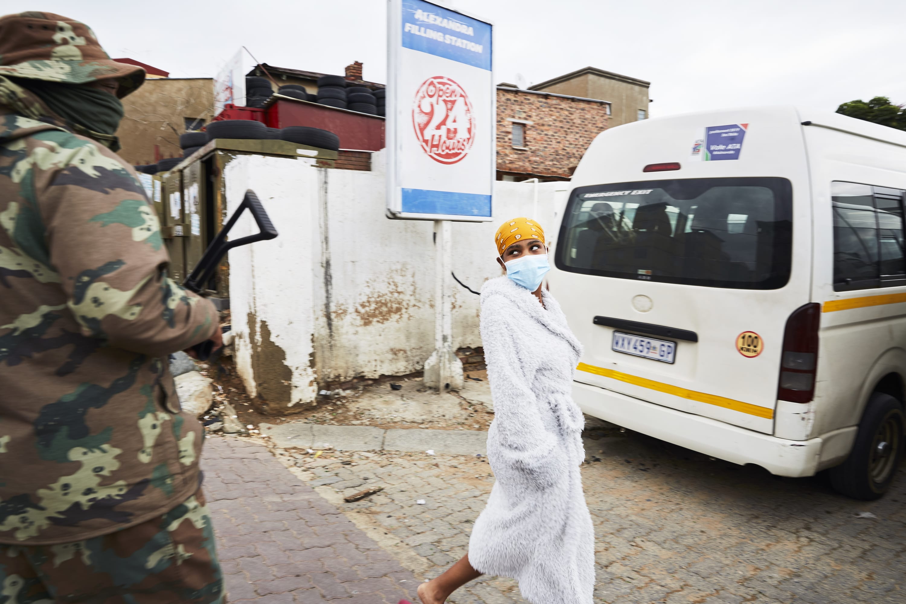 Context of the artwork A young lady rolls her eyes as she gets teased by a patrolling army officer. Lock...