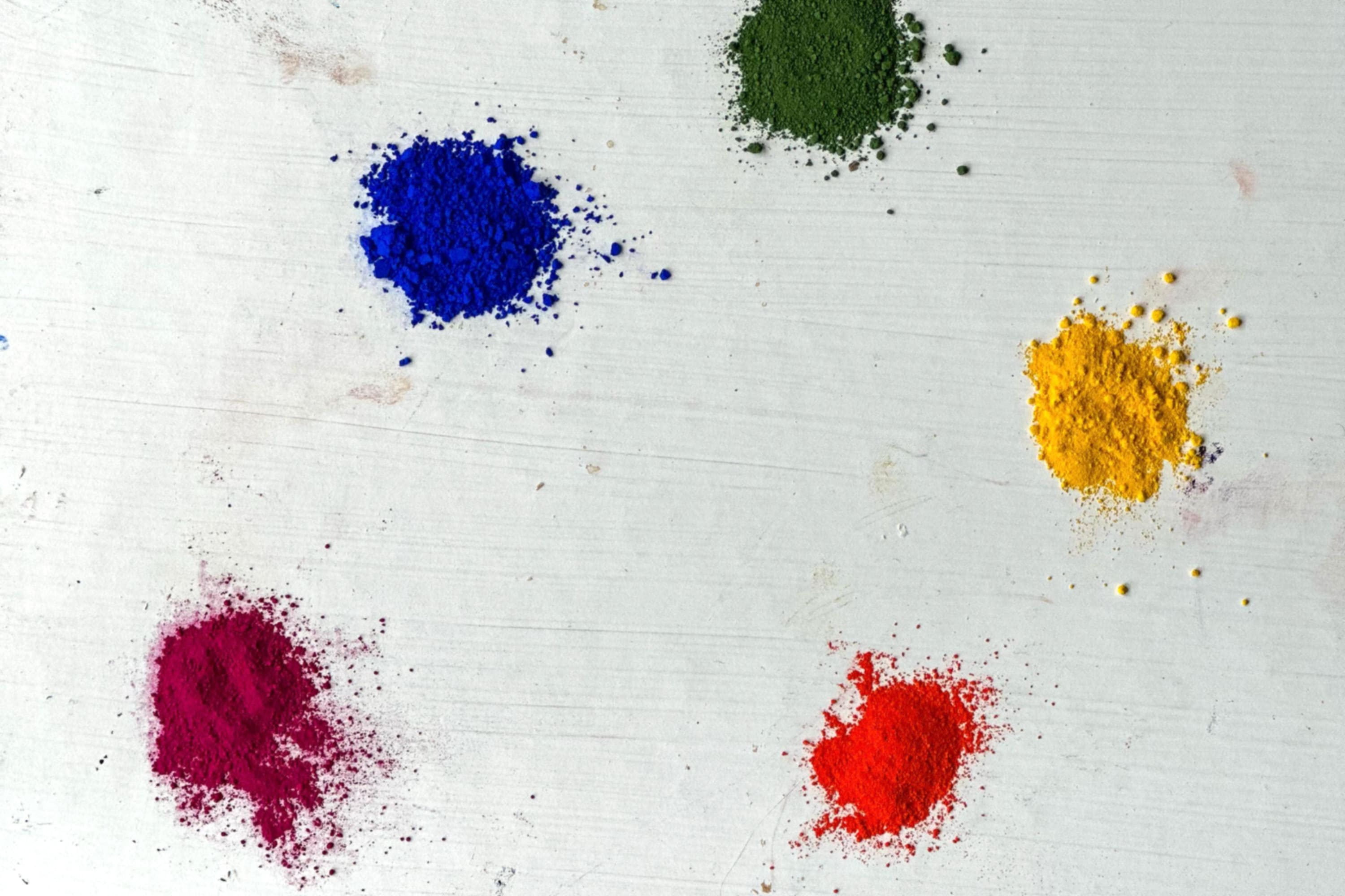 Pigment jars and painting tools in artist studio