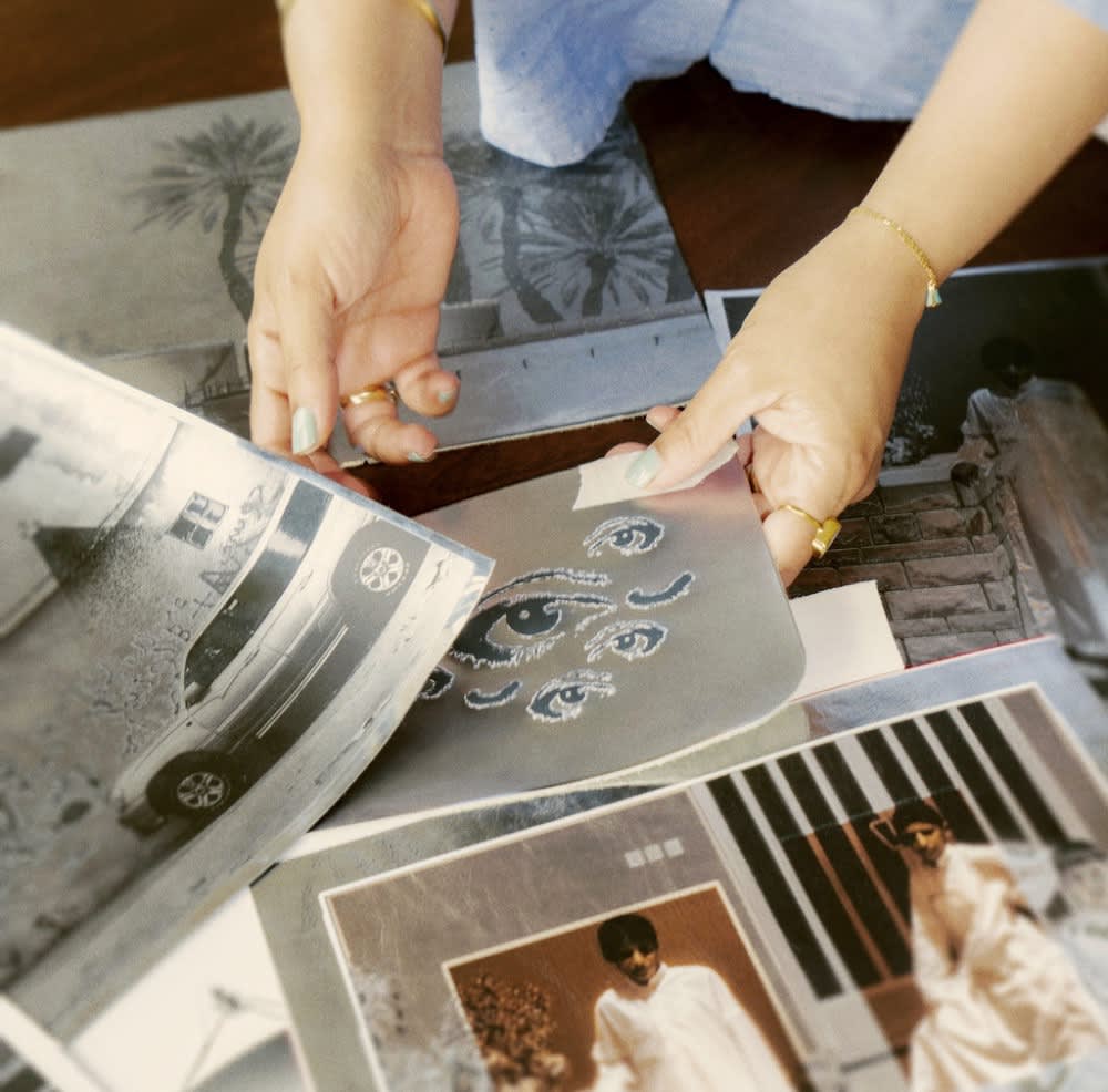 The first bag, The Boys, depicts three young boys and a Land Cruiser set against a graffiti-emblazoned wall, a combination...