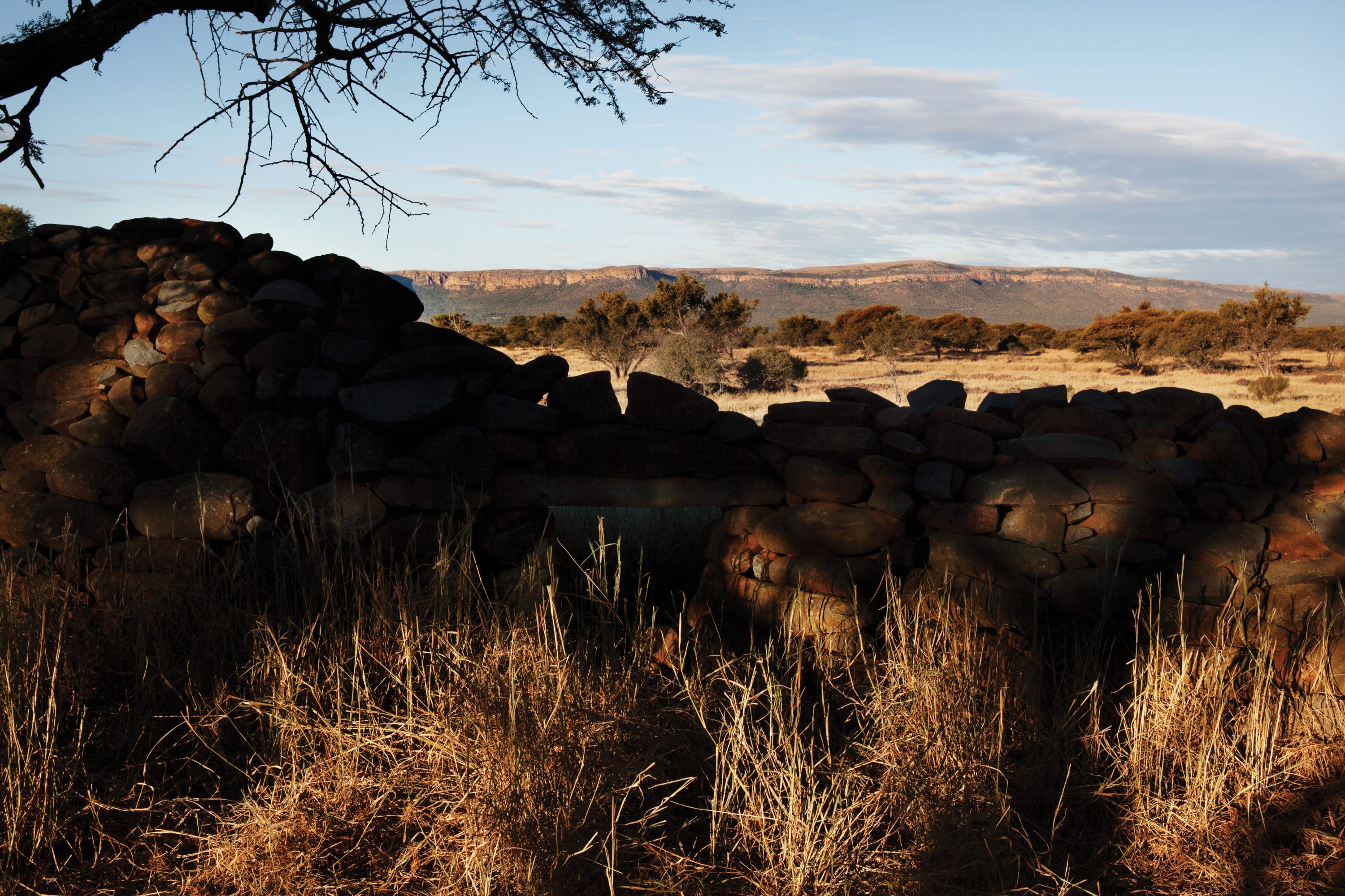 At one time, Molokwane was a large settlement of the Sotho-Tswana people. The stone wall structures are reflective of early...