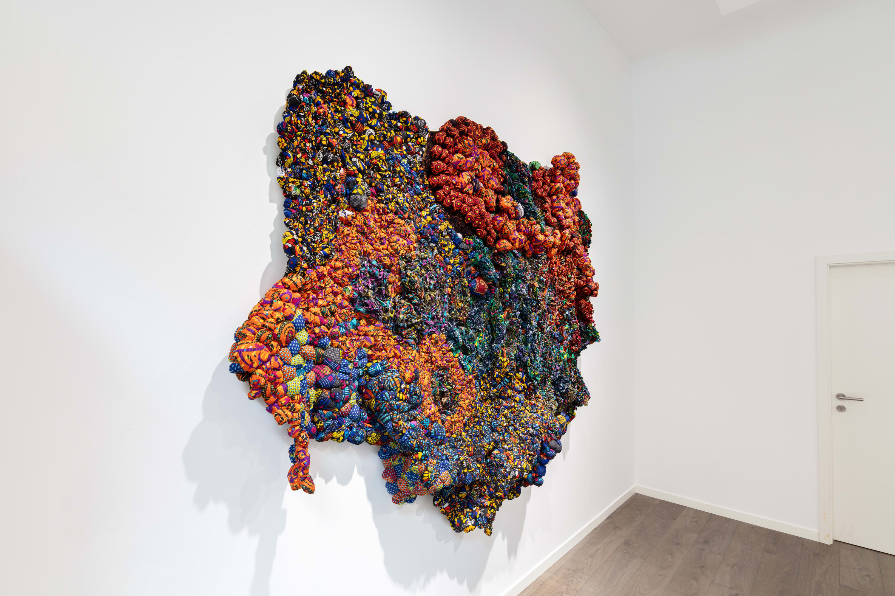 Growing up amidst the industrious spaces of his father’s shoemaking workshop and his mother’s tailoring business, Nnorom began drawing at...