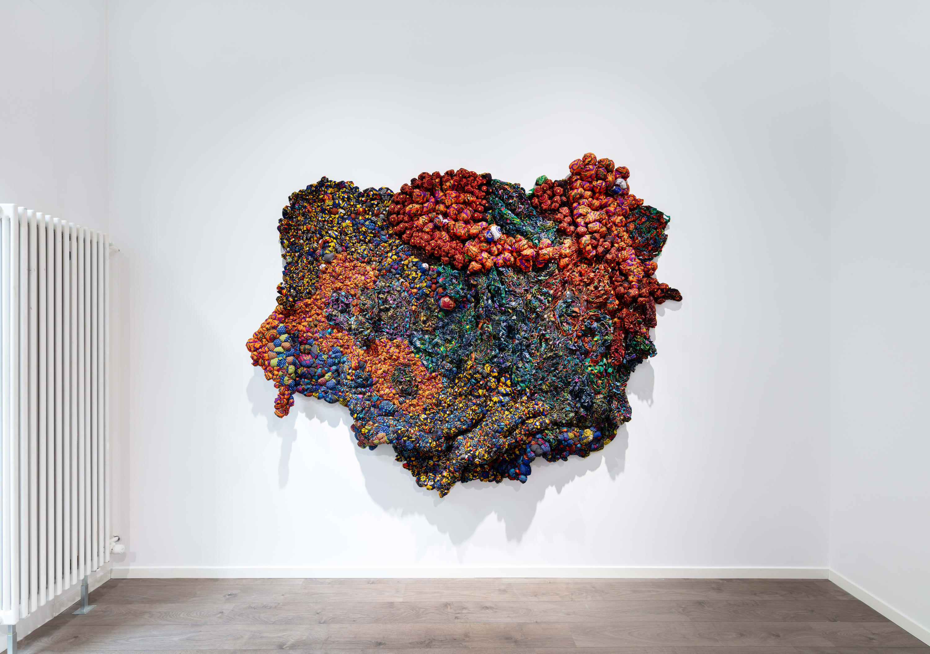 Growing up amidst the industrious spaces of his father’s shoemaking workshop and his mother’s tailoring business, Nnorom began drawing at...