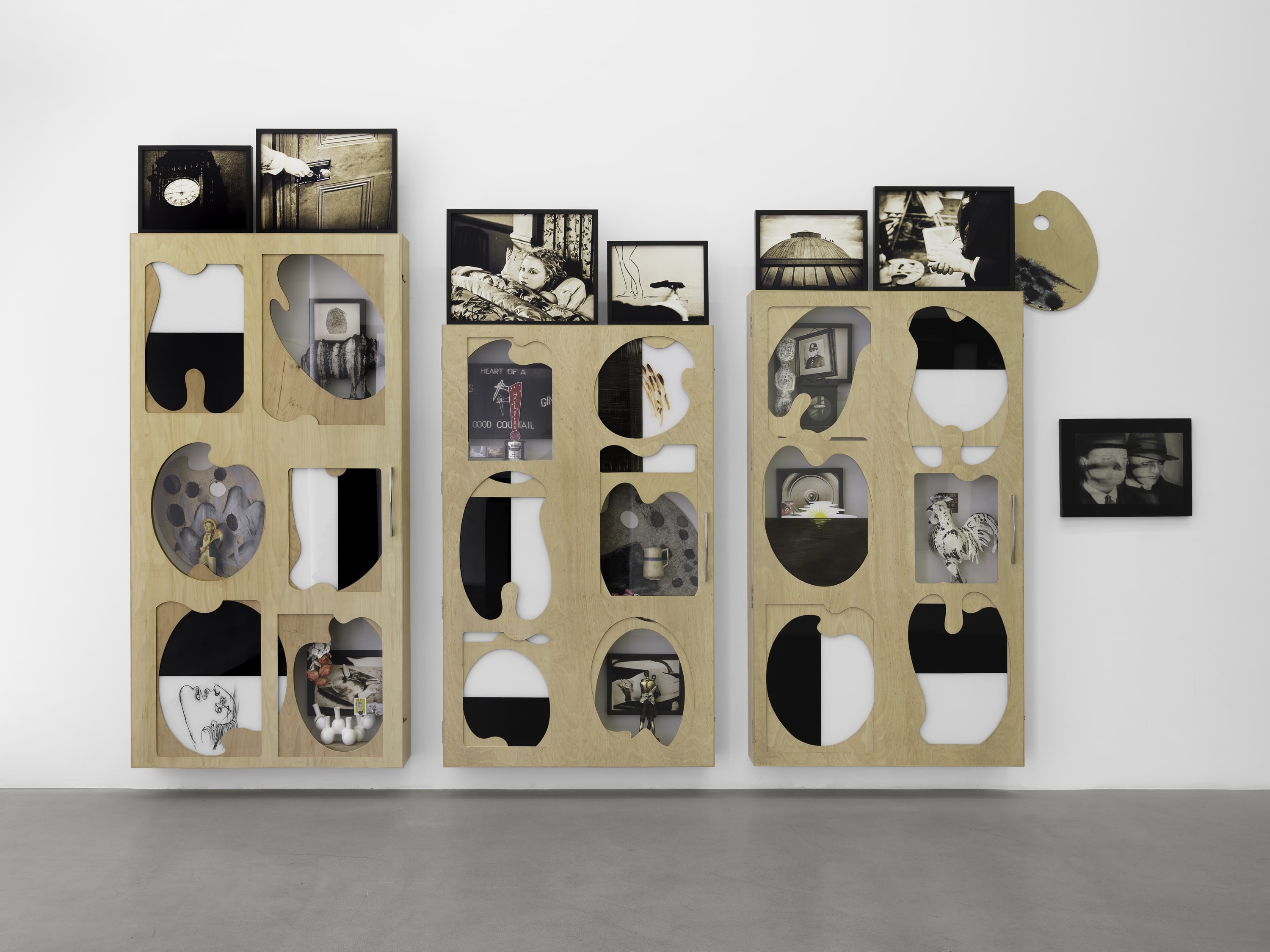 Atul Dodiya Untitled 2018 Three wooden cabinet installation with painted glass, framed photographs and found objects 237.7 x 405.4 cm...