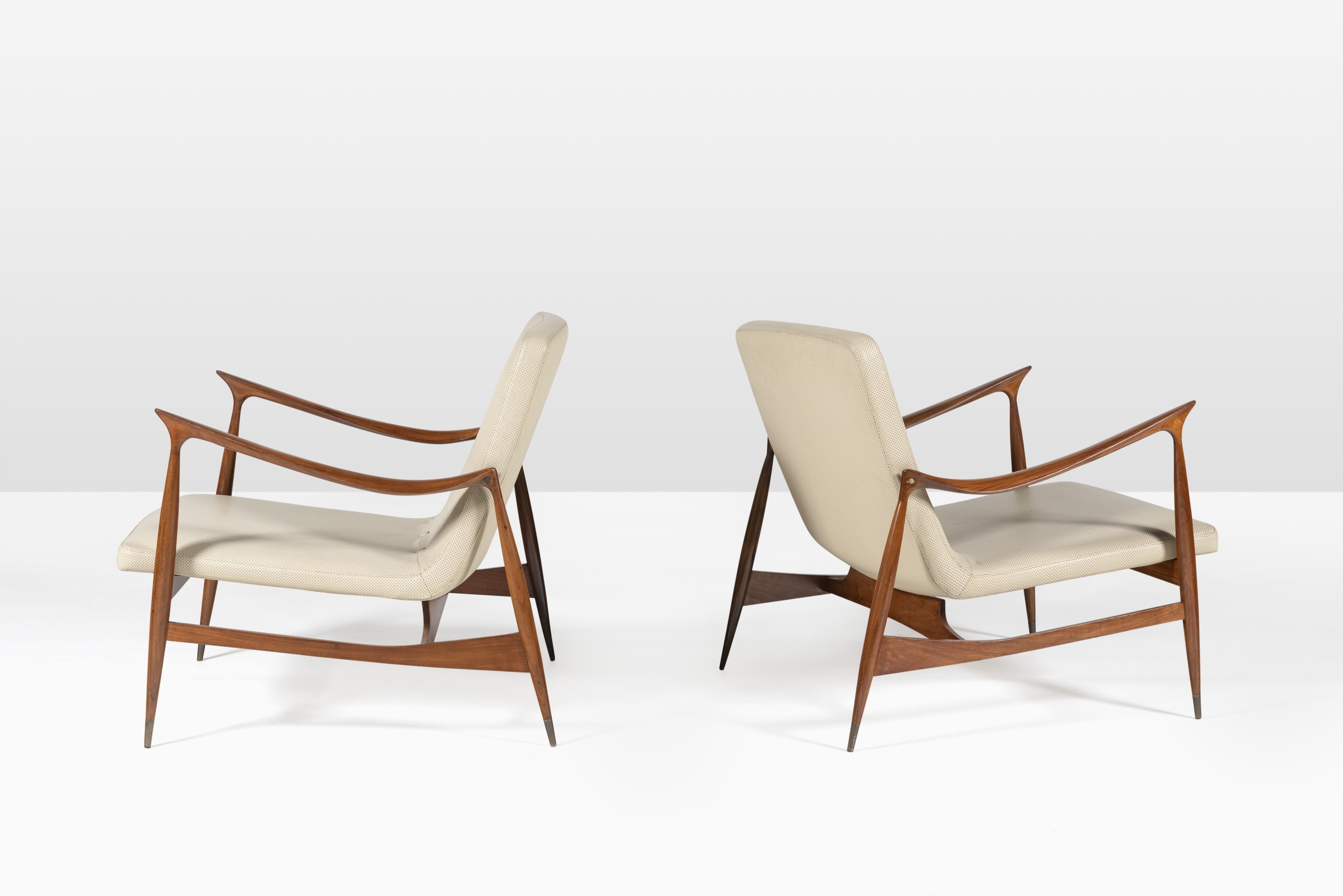 Pair of Dinamarquesa armchairs, 1956 Caviuna Brazilian Rosewood, brass feet with wood finish. 67 x 70 x 75 cm (26...