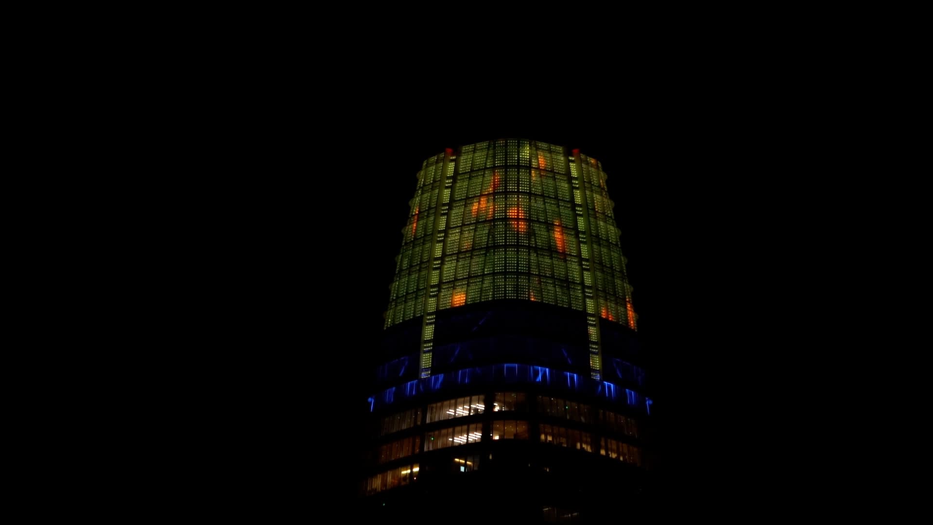 Salesforce tower depicting work by Jim Campbell.