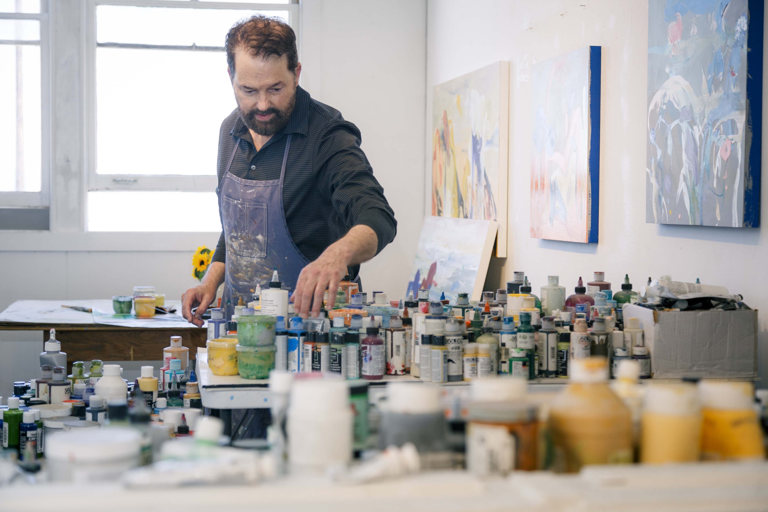 Q: In three words describe your work. A: Abstract. Botanical. Paintings.