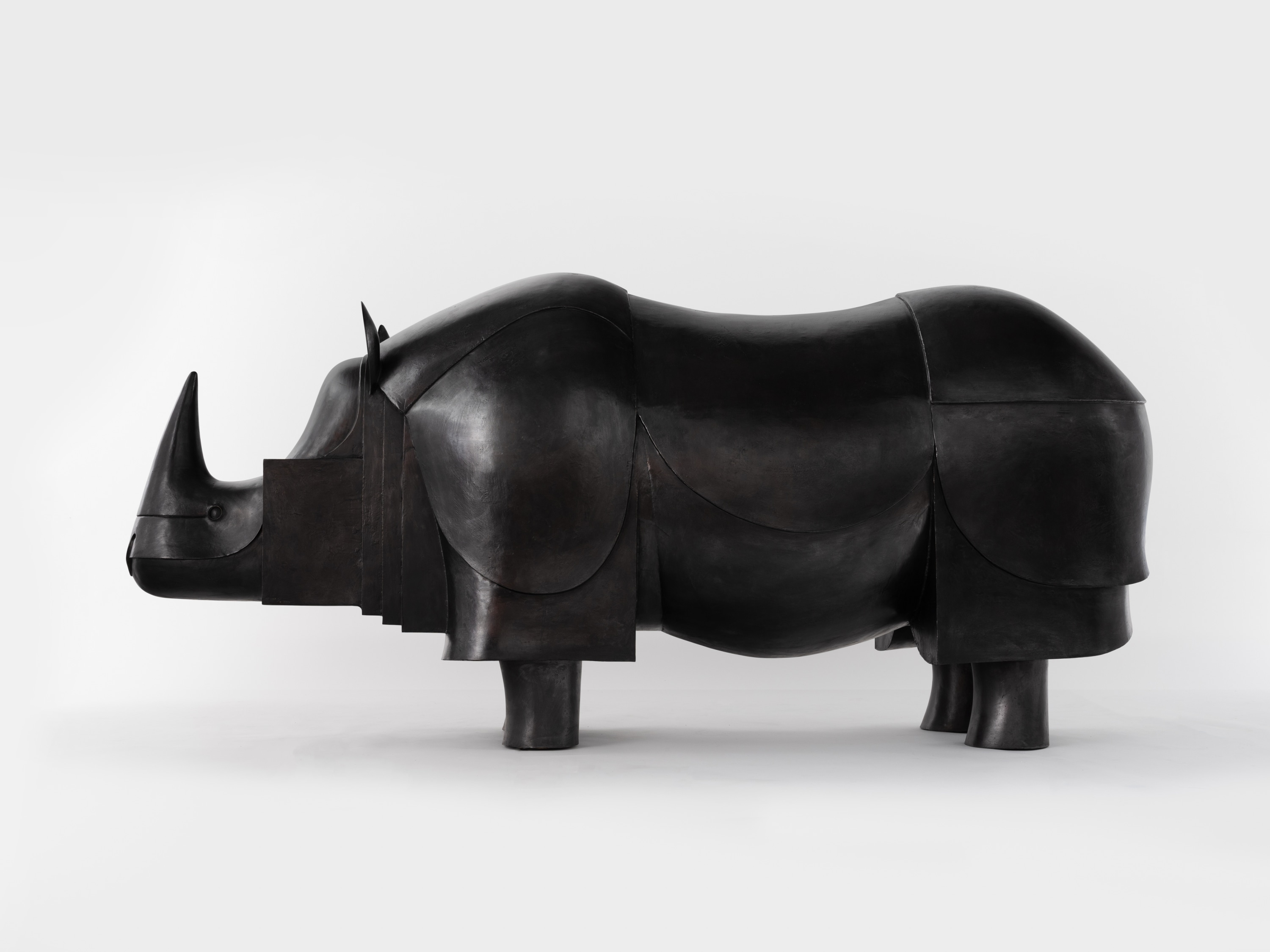 François-Xavier Lalanne Grand Rhinocéros V, 1994/2000 bronze with black patina 47 x 101 1/2 x 29 inches 119.4 x 257.8...