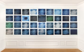 Installation of 36 toned gelatin silver “Correspondence” prints at the gallery