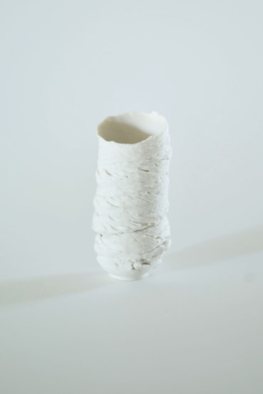 Sam Chatto  Torqued Vessel VI, 2024  Porcelain  10 x 4 cm