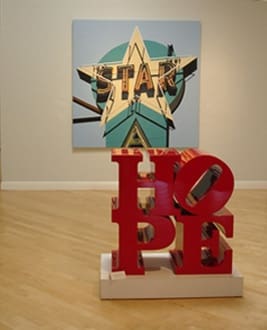 Installation view of Robert Cottingham's "Aqua Star" and Robert Indiana's "HOPE"