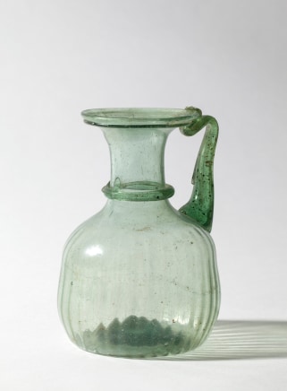 Roman clear green juglet, c.4th century