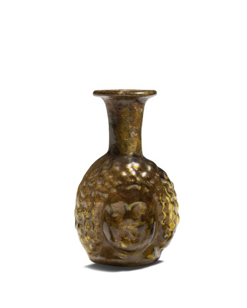 Roman clear olive-green head flask, c.4th-5th century AD