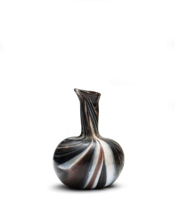 55. Roman marbled spouted bottle, 1st century AD
