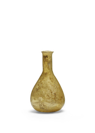 Roman clear amber coloured bottle, 1st-3rd century AD
