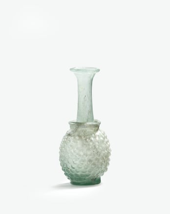 88. Roman clear-blue grape flask, Syro-Palestinian, 2nd-3rd century AD