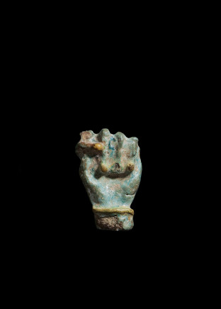 Egyptian clenched fist amulet, Roman Period, c.30 BC-400 AD