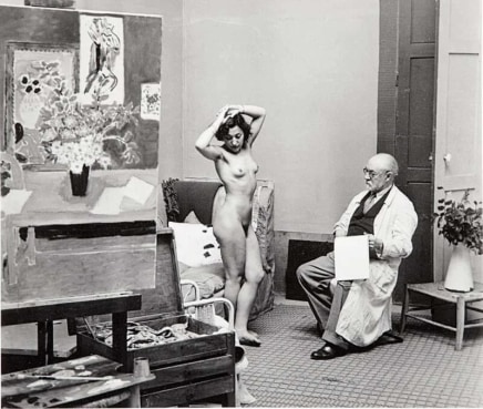 Brassaï, Matisse with his model, on the easel the first version of his canvas Liseus sur Fond Noir, 1939