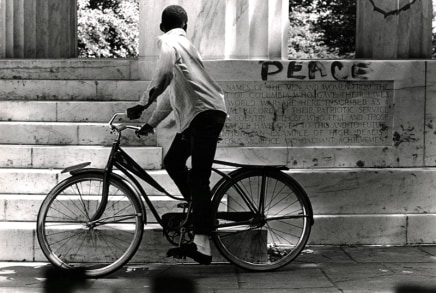 Jill Freedman, Untitled [Boy on bike, War Memorial, Washington DC], 1968