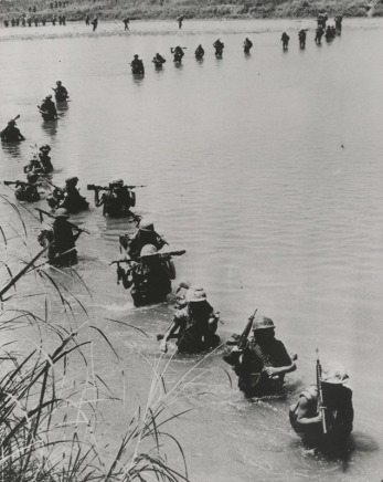 Photographer Unknown, [U.S. Marines soldiers cross a river while in pursuit of the Viet Cong], June 19, 1969