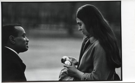 Dave Heath, Washington Square, New York City [Man with woman holding Easter eggs], Easter Sunday 1966