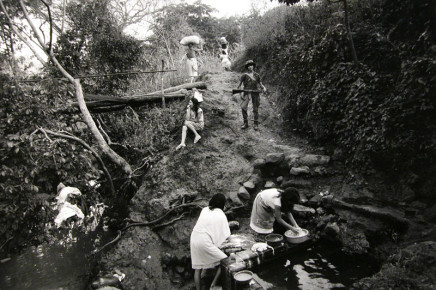 Larry Towell, Santa Maria, Cabañas, El Salvador [washing clothes], 1991