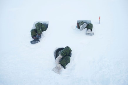 Louie Palu, Canadian soldiers in Resolute Bay, Nunavut tunneling into the side of a hill creating a shelter known as a snow cave. This is an improvised shelter for survival in extreme Arctic weather when there is limited or lack of conventional shelter like a tent av, 2018