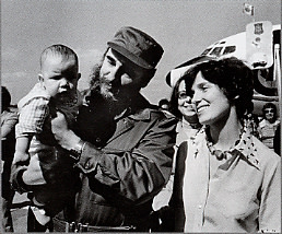 Fred Chartrand, Margaret Trudeau smiles as Cuban President Fidel Castro holds her youngest son Michel after the Trudeaus arrive in Havana, Cuba, January 26, 1976