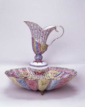A CHINESE CANTON ENAMEL HELMET SHAPED EWER AND SHELL SHAPED BASIN, First half of the eighteenth century
