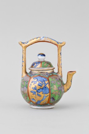 A CHINESE MINIATURE ‘CLOBBERED’ TEAPOT AND COVER, Kangxi 1662-1722