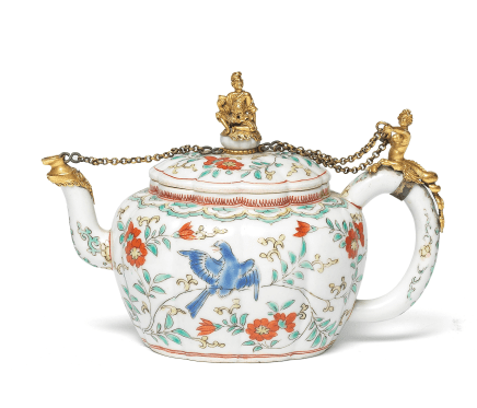 A JAPANESE KAKIEMON ORMOLU-MOUNTED LOBED TEAPOT AND COVER , The teapot, Japanese Edo (late 17th century); the mount European, possibly German, early 18th century.