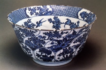 A FINE AND LARGE BLUE AND WHITE MOULDED FLARING BOWL, Kangxi (1662 - 1722)