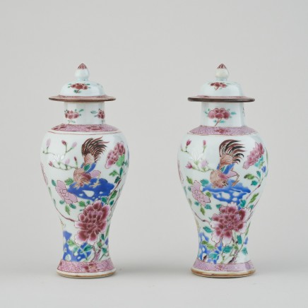 A PAIR OF CHINESE FAMILLE ROSE VASES AND COVERS, Qianlong (1736 – 1795)