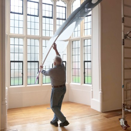 Neil Dawson installing Feather (Gull), March 2019, The Central Art Gallery