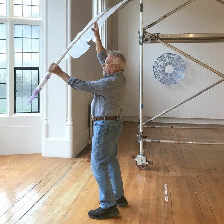 Neil Dawson installing Feather (Gull), March 2019, The Central Art Gallery