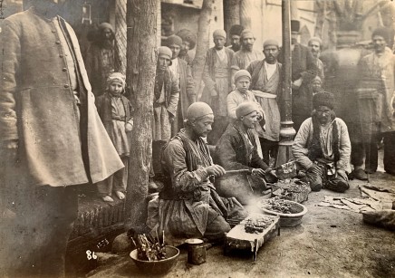Antoin Sevruguin, A Jegaraki at the side of the street in Tehran, Late 19th Century or early 20th Century