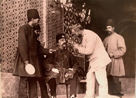 Antoin Sevruguin, Barber dyeing the mustache of Mozaffar ad-Din Shah Qajar, Late 19th Century