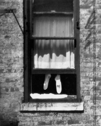 New York [Socks hanging in window], July 26, 1960 © The Estate of André Kertész, New York