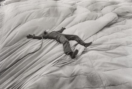 Jill Freedman, Untitled [Man on top of circus tent], 1972