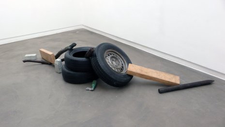 Fernando Sánchez Castillo Barricade, 2008 2 bricks, 1 beer bottle, 5 pieces of wood of around 70 cm, 1 piece of iron, 3 tires, all cast in bronze unique variable sizes (AG.FC.08.5144)