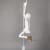 Large sculpture hanging from the ceiling of a girl swinging wearing sneakers