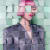 Portrait of woman with pink hair and grey jacket on mint background, broken up into a puzzle like grid.