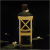 Bezt painting of man from behind sitting in chair with a rat on his right shoulder. Chair is in water, lilipads floating on surface