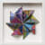 colorful sculptural work made of hand cut wood shapes by Sean Newport