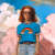 Painting by Alex Garant featuring a solitary figure against a pink sky background