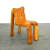 photo of a wooden chair shaped like a human