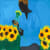 John Madu - Sunflowers and man - AFIKARIS Gallery