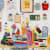 detail of painting by Michael McGregor of colorful studio wall with assorted objects