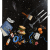 painting of objects such as a book, candelabra, paintbrush, tape, mug, and more drifting through space and off the canvas