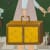painting by Angela Burson - woman holding vintage suitcase, cat to left. Woman's hand is extended and holding a key